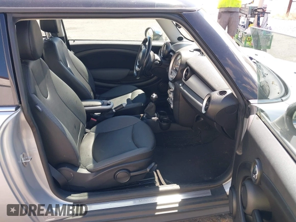 2009 MINI Hardtop with VIN WMWMF335X9TU71767, listed as a IAAI auction lot 42696886 with 105,408 mi miles and . Bid and sale history available at DreamBid. Image 5.