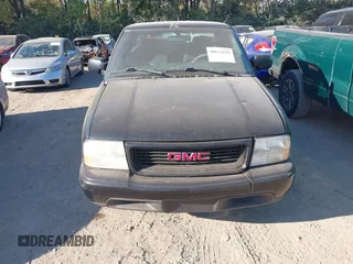 2000 GMC Sonoma SLS with VIN 1GTCS19W0Y8256706, listed as a IAAI auction lot 40631659 with 145,163 mi miles and . Bid and sale history available at DreamBid. Image 6.