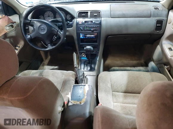 1998 Nissan Maxima GXE with VIN JN1CA21D3WT532196, listed as a Copart auction lot 43210915 with 277,946 mi miles and Salvage title. Bid and sale history available at DreamBid. Image 8.