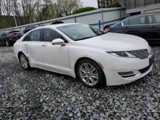 2013 Lincoln MKZ с VIN 3LN6L2JK8DR808143, выставлен на аукционе Copart как лот 55599085 с пробегом 179 774 миль миль и Чистый • Clean title. История ставок и продаж доступна на DreamBid. Изображение 4.
