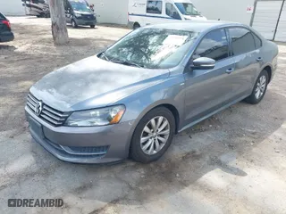 2014 Volkswagen Passat Wolfsburg Ed with VIN 1VWAT7A39EC109525, listed as a IAAI auction lot 41919773 with 133,510 mi miles. Bid and sale history available at carsss.com. Image 2.