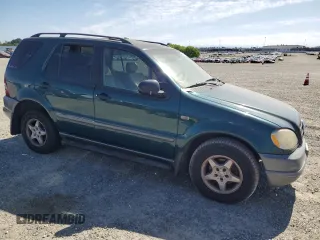 1999 Mercedes-Benz M 320/430/500 z VIN 4JGAB54E4XA106856, wystawiony jako Copart lot #57692675 z przebiegiem 250 488 mil mil oraz Czysty tytuł • Clean title. Historia ofert i sprzedaży dostępna na DreamBid. Obrazek 4.