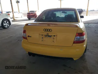 2000 Audi S4 z VIN WAUDD68D1YA107657, wystawiony jako Copart lot #81312104 z przebiegiem 133 371 mil mil oraz Tytuł czysty. Historia ofert i sprzedaży dostępna na DreamBid. Obrazek 6.