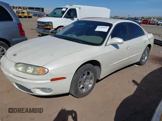 2001 Oldsmobile Aurora z VIN 1G3GR64H414288395, wystawiony jako IAAI lot #42260825 z przebiegiem 246 744 mil mil oraz . Historia ofert i sprzedaży dostępna na DreamBid. Obrazek 2.