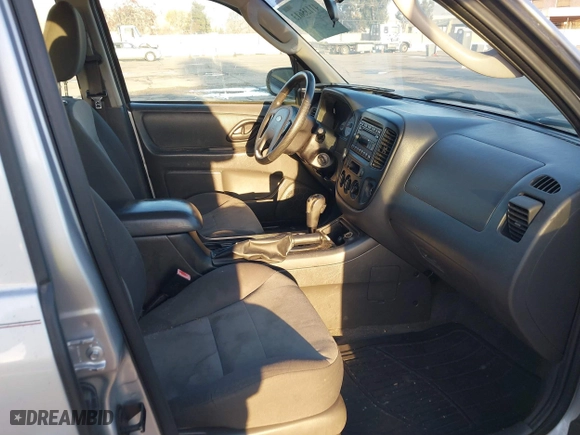 2007 Ford Escape XLS with VIN 1FMYU02Z07KB60389, listed as a IAAI auction lot 41135613 with 124,813 mi miles. Bid and sale history available at carsss.com. Image 5.