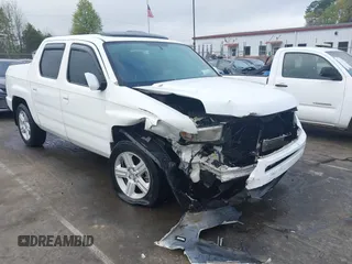 2014 Honda Ridgeline RTL with VIN 5FPYK1F58EB011186, listed as a IAAI auction lot 41903178 with 113,364 mi miles. Bid and sale history available at carsss.com. Image 1.