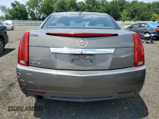2012 Cadillac CTS Luxury with VIN 1G6DE5E54C0138040, listed as a Copart auction lot 61997305 with 140,996 mi miles and Salvage title. Bid and sale history available at DreamBid. Image 6.
