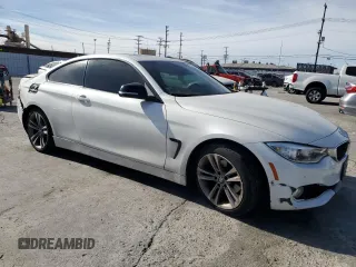 2015 BMW 4 Series 428i with VIN WBA3N3C53FK234442, listed as a Copart auction lot 46535395 with 100,351 mi miles and Salvage Title. Bid and sale history available at DreamBid. Image 4.