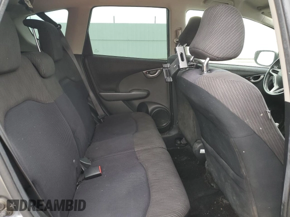 2013 Honda Fit Sport z VIN LUCGE8H70D3007465, wystawiony jako Copart lot #53542045 z przebiegiem 223 335 mil mil oraz Szkoda całkowita • Salvage title. Historia ofert i sprzedaży dostępna na DreamBid. Obrazek 10.