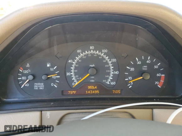 1997 Mercedes-Benz E-Class with VIN WDBJF72F0VA523161, listed as a Copart auction lot 77752804 with 143,495 mi miles and Salvage Title. Bid and sale history available at carsss.com. Image 9.