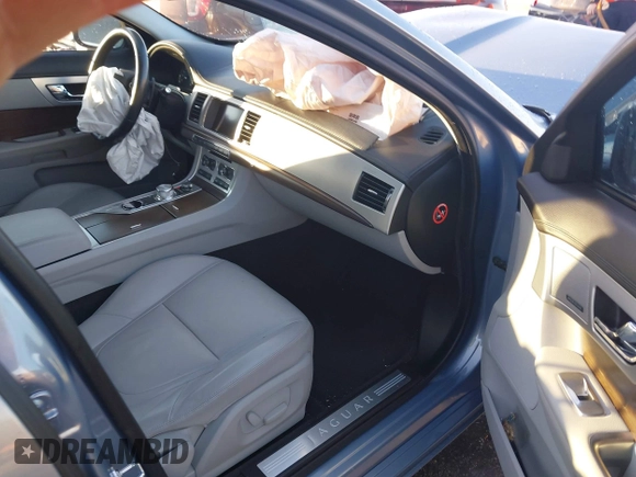 2013 Jaguar XF I4 RWD with VIN SAJWA0ES4DPS95992, listed as a IAAI auction lot 41248969 with 56,024 mi miles. Bid and sale history available at carsss.com. Image 5.