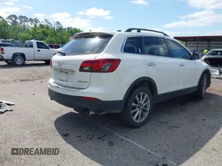 2014 Mazda CX-9 Grand Touring with VIN JM3TB2DA8E0436650, listed as a IAAI auction lot 42147525 with 124,179 mi miles and . Bid and sale history available at DreamBid. Image 4.