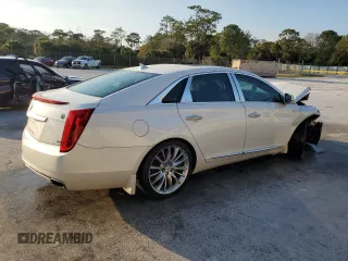 2014 Cadillac XTS Platinum z VIN 2G61W5S84E9153242, wystawiony jako Copart lot #88361685 z przebiegiem 141 401 mil mil oraz Szkoda całkowita • Salvage title. Historia ofert i sprzedaży dostępna na DreamBid. Obrazek 3.
