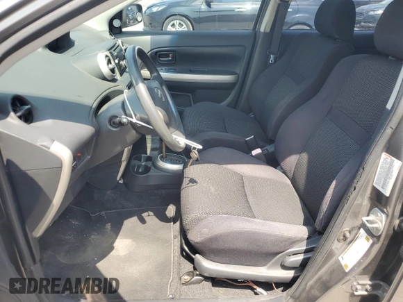 2004 Scion xA with VIN JTKKT624840061212, listed as a Copart auction lot 56391555 with 152,361 mi miles and Salvage Title. Bid and sale history available at DreamBid. Image 7.