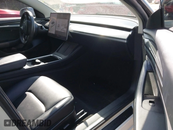 2022 Tesla Model 3 with VIN 5YJ3E1EA5NF124148, listed as a IAAI auction lot 41908884 with 45,115 mi miles. Bid and sale history available at carsss.com. Image 5.