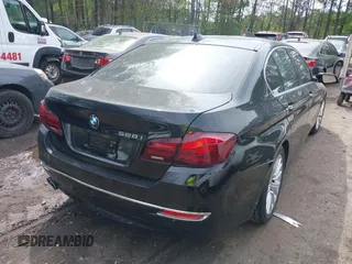 2016 BMW 5 Series 528i xDrive with VIN WBA5A7C57GG643446, listed as a IAAI auction lot 42039384 with 132,119 mi miles. Bid and sale history available at carsss.com. Image 4.