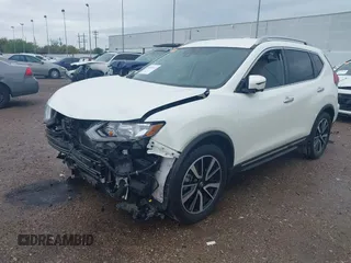 2020 Nissan Rogue S with VIN 5N1AT2MT0LC751724, listed as a IAAI auction lot 41870342 with 33,920 mi miles and . Bid and sale history available at DreamBid. Image 2.
