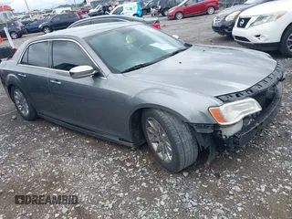 2012 Chrysler 300 Limited z VIN 2C3CCACG7CH310847, wystawiony jako IAAI lot #42340073 z przebiegiem 259 158 mil mil oraz . Historia ofert i sprzedaży dostępna na DreamBid. Obrazek 1.