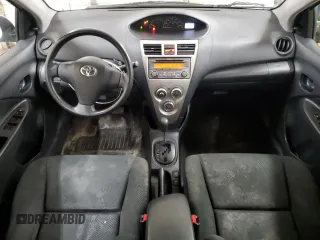 2012 Toyota Yaris z VIN JTDBT4K30CL016555, wystawiony jako Copart lot #55605565 z przebiegiem 164 046 mil mil oraz Szkoda całkowita • Salvage title. Historia ofert i sprzedaży dostępna na DreamBid. Obrazek 8.