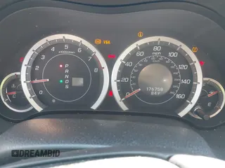 2009 Acura TSX with VIN JH4CU26619C010409, listed as a IAAI auction lot 39634371 with 76,758 mi miles. Bid and sale history available at carsss.com. Image 7.