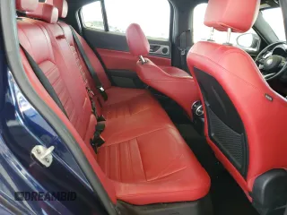 2020 Alfa Romeo Giulia Ti Sport z VIN ZARFANBN7L7632914, wystawiony jako Copart lot #55761355 z przebiegiem 26 635 mil mil oraz Szkoda całkowita • Salvage title. Historia ofert i sprzedaży dostępna na DreamBid. Obrazek 10.