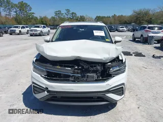 2024 Volkswagen Tiguan SE with VIN 3VVNB7AX2RM022579, listed as a IAAI auction lot 41819850 with 8,651 mi miles and . Bid and sale history available at DreamBid. Image 12.