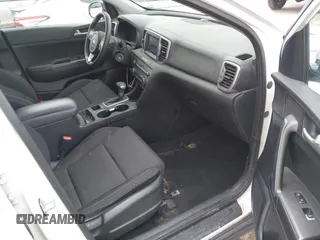 2018 Kia Sportage LX with VIN KNDPM3AC1J7413227, listed as a IAAI auction lot 42188566 with 77,897 mi miles and . Bid and sale history available at carsss.com. Image 5.