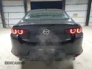 2019 Mazda 3 Premium with VIN 3MZBPAEM7KM102348, listed as a Copart auction lot 84587534 with 73,125 mi miles and Salvage Title. Bid and sale history available at DreamBid. Image 6.