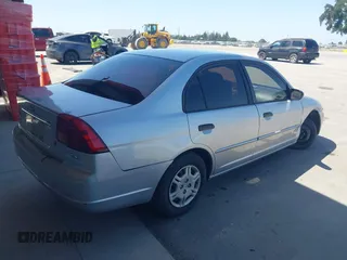 2001 Honda Civic LX with VIN 2HGES15541H585531, listed as a IAAI auction lot 42084501 with 229,328 mi miles. Bid and sale history available at carsss.com. Image 4.