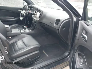 2013 Dodge Charger SXT with VIN 2C3CDXHG2DH525370, listed as a IAAI auction lot 41395980 with 226,079 mi miles. Bid and sale history available at carsss.com. Image 5.