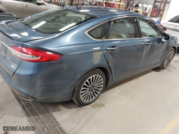 2018 Ford Fusion Titanium with VIN 3FA6P0D97JR271966, listed as a IAAI auction lot 41722535 with 118,304 mi miles. Bid and sale history available at carsss.com. Image 4.