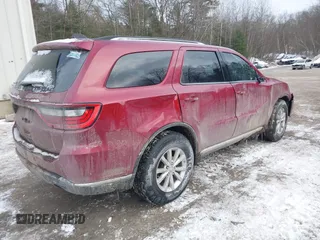 2015 Dodge Durango SXT with VIN 1C4RDJAG6FC888810, listed as a IAAI auction lot 41304507 with 125,936 mi miles and . Bid and sale history available at carsss.com. Image 4.