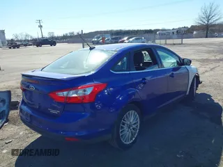2014 Ford Focus Titanium with VIN 1FADP3J21EL427066, listed as a IAAI auction lot 41653163 with 1 mi miles. Bid and sale history available at carsss.com. Image 4.