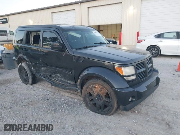 2010 Dodge Nitro SE with VIN 1D4PT2GK3AW137797, listed as a IAAI auction lot 41689701 with 182,452 mi miles. Bid and sale history available at carsss.com. Image 1.