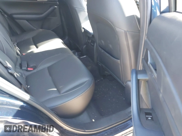 2020 Mazda CX-30 Select with VIN 3MVDMBCL4LM140110, listed as a IAAI auction lot 42194090 with 33,965 mi miles and . Bid and sale history available at DreamBid. Image 8.