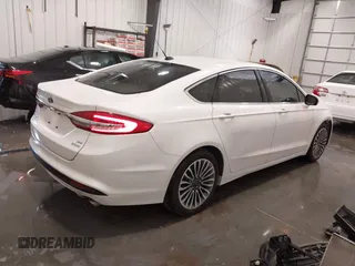 2017 Ford Fusion SE z VIN 3FA6P0HD5HR367474, wystawiony jako IAAI lot #42179210 z przebiegiem 81 852 mil mil oraz . Historia ofert i sprzedaży dostępna na DreamBid. Obrazek 4.