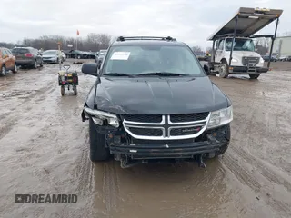 2013 Dodge Journey R/T with VIN 3C4PDDFG7DT724534, listed as a IAAI auction lot 41161346 with 175,606 mi miles and . Bid and sale history available at DreamBid. Image 6.