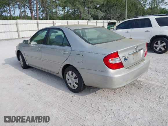 2004 Toyota Camry LE with VIN 4T1BE32K04U286257, listed as a IAAI auction lot 42079619 with 205,634 mi miles. Bid and sale history available at carsss.com. Image 3.