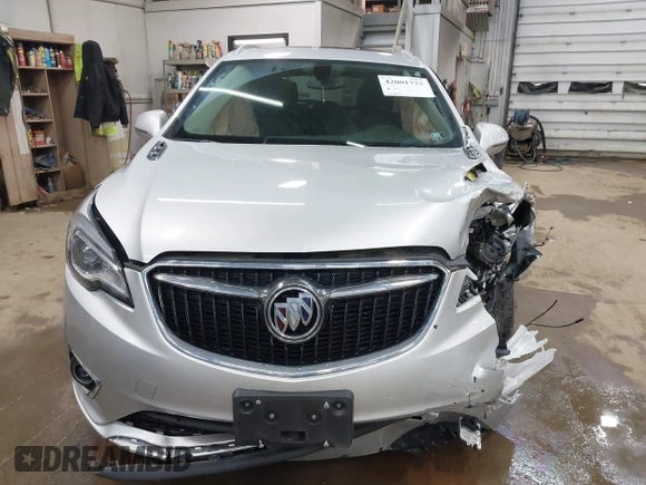 2019 Buick Envision Essence with VIN LRBFXCSA3KD119247, listed as a IAAI auction lot 42001735 with 51,566 mi miles and . Bid and sale history available at carsss.com. Image 12.