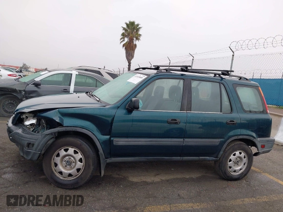 1998 Honda CR-V LX z VIN JHLRD1749WC068852, wystawiony jako IAAI lot #41915089 z przebiegiem 241 163 mil mil oraz . Historia ofert i sprzedaży dostępna na DreamBid. Obrazek 14.