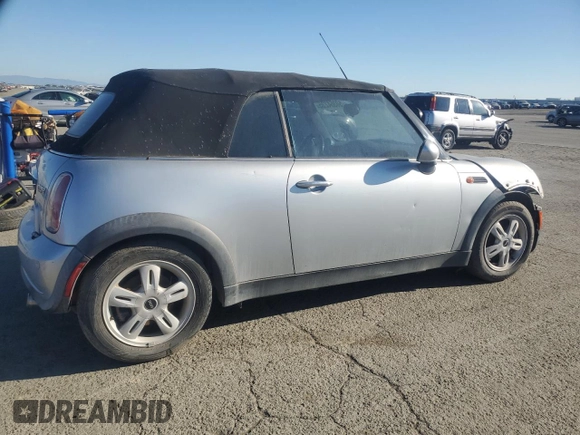 2005 MINI Convertible with VIN WMWRF33465TG10044, listed as a Copart auction lot 50364235 with 152,186 mi miles and Salvage title. Bid and sale history available at DreamBid. Image 3.