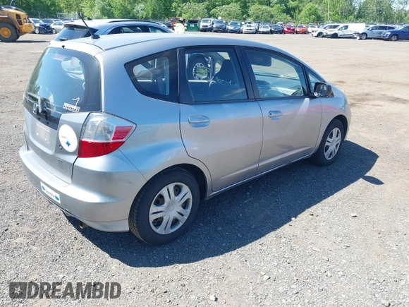 2009 Honda Fit with VIN JHMGE882X9S000639, listed as a IAAI auction lot 42308524 with 211,128 mi miles and . Bid and sale history available at DreamBid. Image 4.