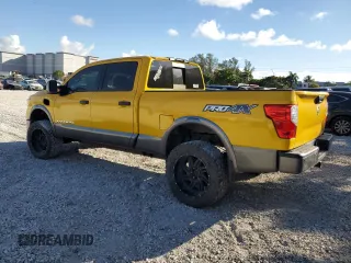 2016 Nissan Titan XD PRO-4X with VIN 1N6BA1F47GN509342, listed as a Copart auction lot 44919795 with 192,684 mi miles and Clean Title. Bid and sale history available at carsss.com. Image 2.