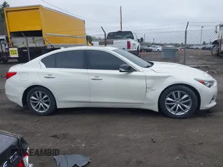 2016 Infiniti Q50 3.0t Premium with VIN JN1EV7AR4GM341324, listed as a IAAI auction lot 42093328 with 95,942 mi miles. Bid and sale history available at carsss.com. Image 13.
