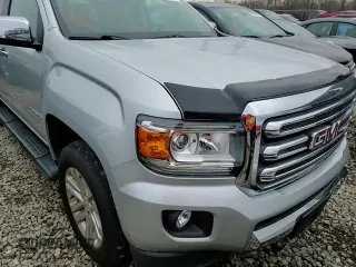 2019 GMC Canyon 4WD SLT with VIN 1GTG6DEN7K1134168, listed as a Copart auction lot 86510834 with 61,889 mi miles and Salvage Title. Bid and sale history available at carsss.com. Image 11.