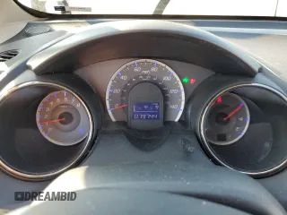 2012 Honda Fit Sport with VIN JHMGE8H52CS003715, listed as a Copart auction lot 63113204 with 79,744 mi miles and Salvage Title. Bid and sale history available at carsss.com. Image 9.