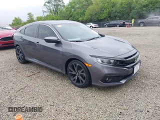 2019 Honda Civic Sport with VIN 2HGFC2F86KH517880, listed as a IAAI auction lot 42305619 with 60,880 mi miles and . Bid and sale history available at DreamBid. Image 1.