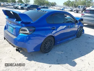 2016 Subaru WRX with VIN JF1VA1B62G9823616, listed as a IAAI auction lot 42028560 with 90,543 mi miles. Bid and sale history available at carsss.com. Image 4.