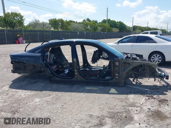 2019 Dodge Charger Scat Pack with VIN 2C3CDXGJ0KH635697, listed as a IAAI auction lot 41924121 with Not Provided miles and . Bid and sale history available at DreamBid. Image 12.