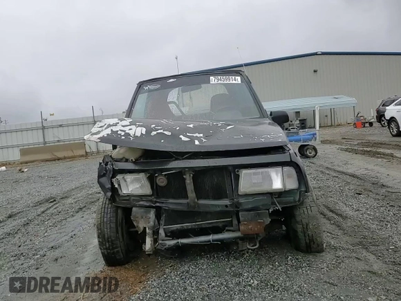 1992 Geo Tracker z VIN 2CNBJ18U8N6938728, wystawiony jako Copart lot #79459914 z przebiegiem 17 751 mil mil oraz Szkody całkowita. Historia ofert i sprzedaży dostępna na DreamBid. Obrazek 10.
